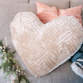 Champagne beige heart-shaped plush throw pillow with fuzzy sherpa texture