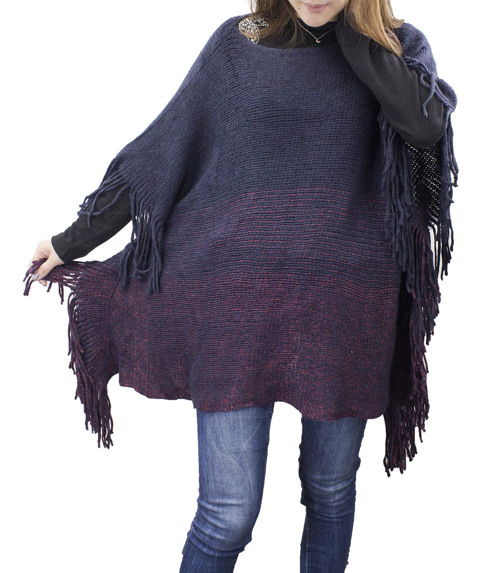 Two-tone knit poncho with long fringe edges and batwing silhouette, navy and burgundy tones