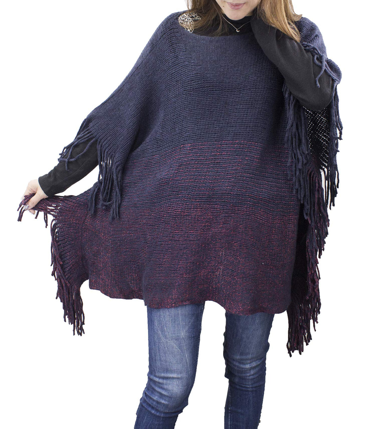 Two-tone knit poncho with long fringe edges and batwing silhouette, navy and burgundy tones