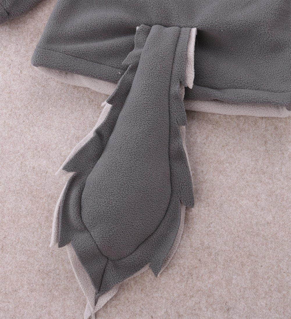 Grey fleece hoodie close-up with layered hood ear shape and dangling tassel details