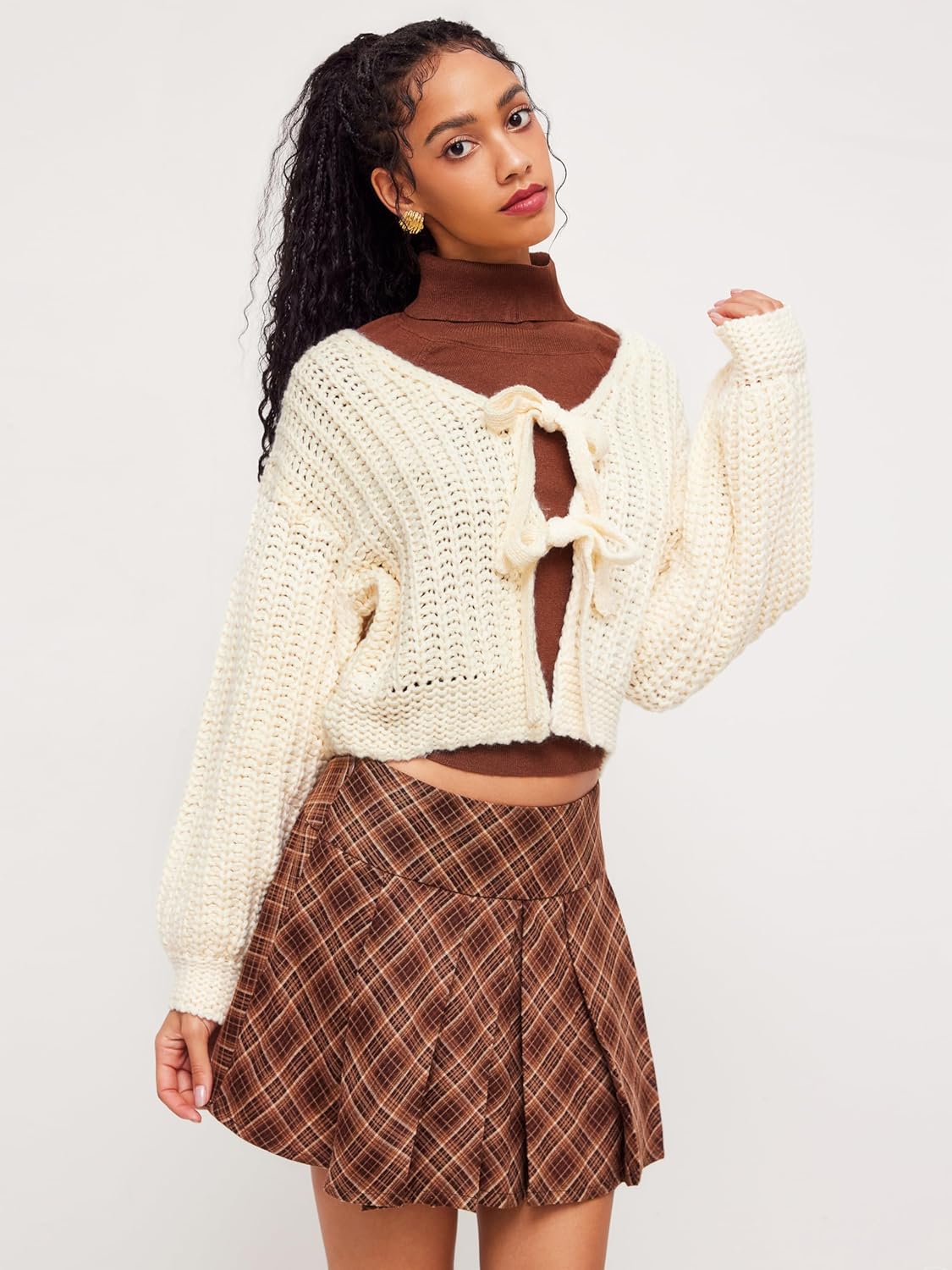 Women’s cream chunky knit cardigan with V-neck and tied center front