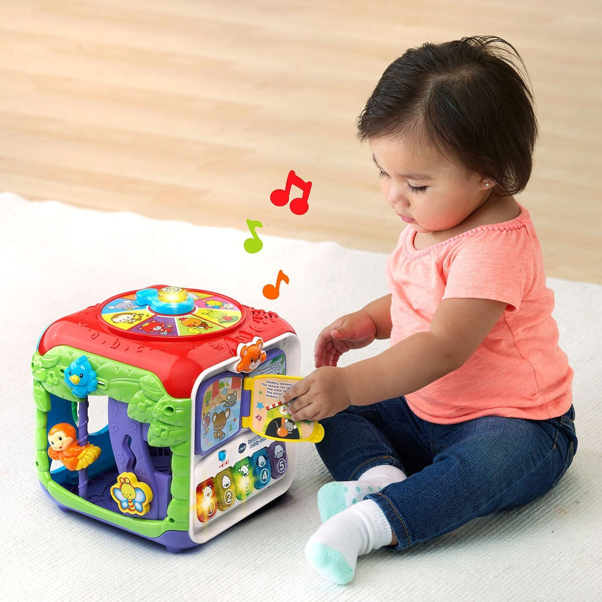 Red baby activity cube with animal and music learning panels
