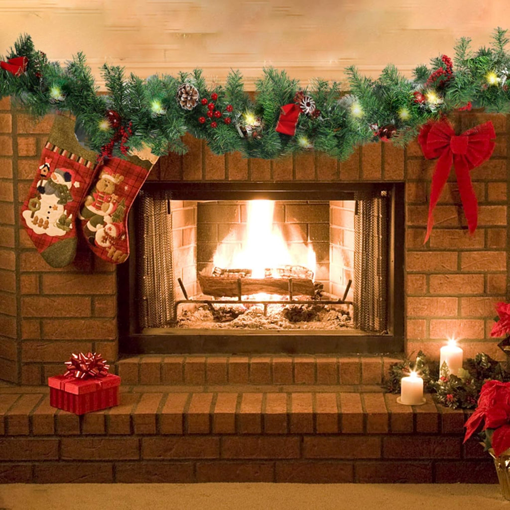 LED Christmas garland across mantel with pine tips, red berries, bows, and warm white lights