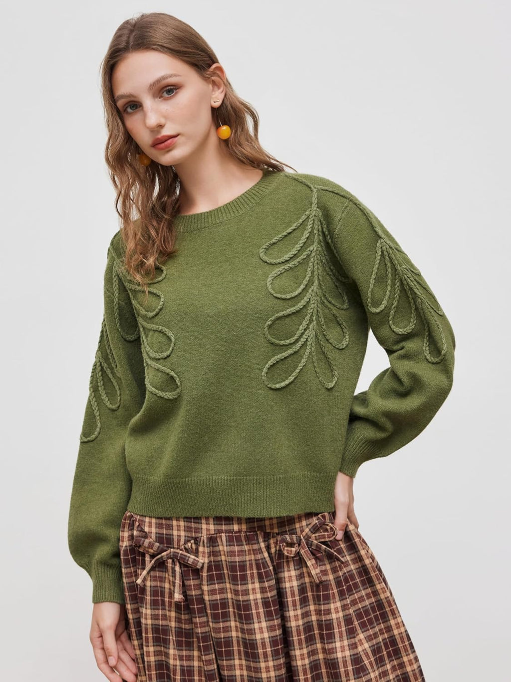 Olive green oversized round-neck sweater with long sleeves and looped leaf embroidery