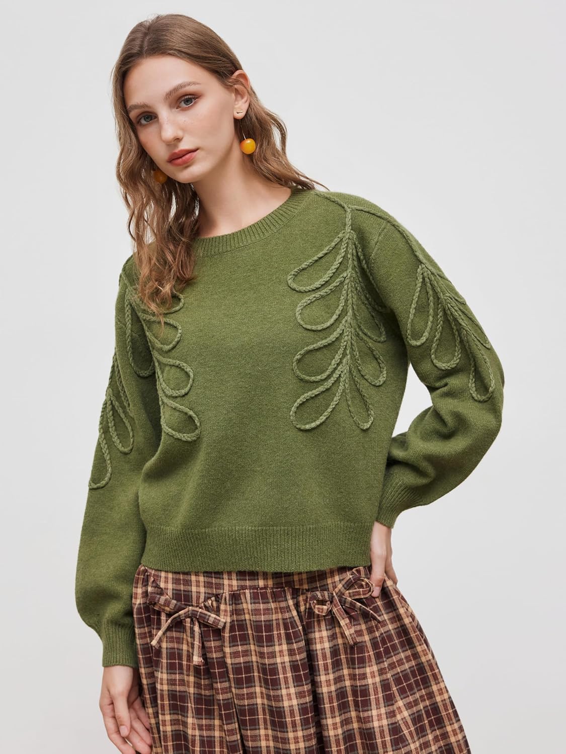 Olive green oversized round-neck sweater with long sleeves and looped leaf embroidery