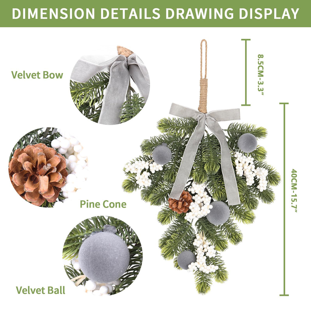 Artificial green wreath with gray velvet bow, pine cone detail, and silver ball decorations
