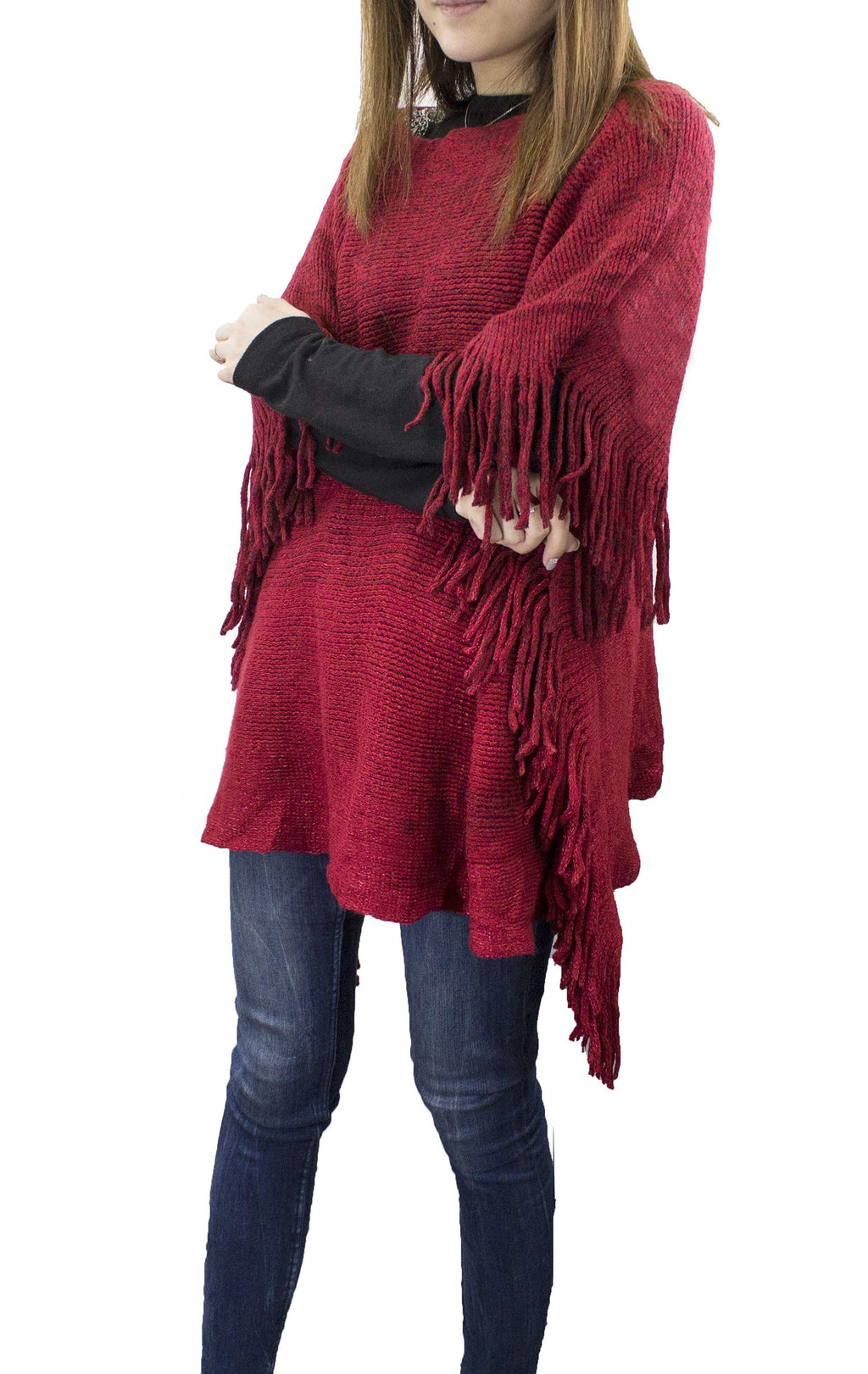 Two-tone knit poncho with fringe trim and batwing sleeves, deep red with dark underlayer