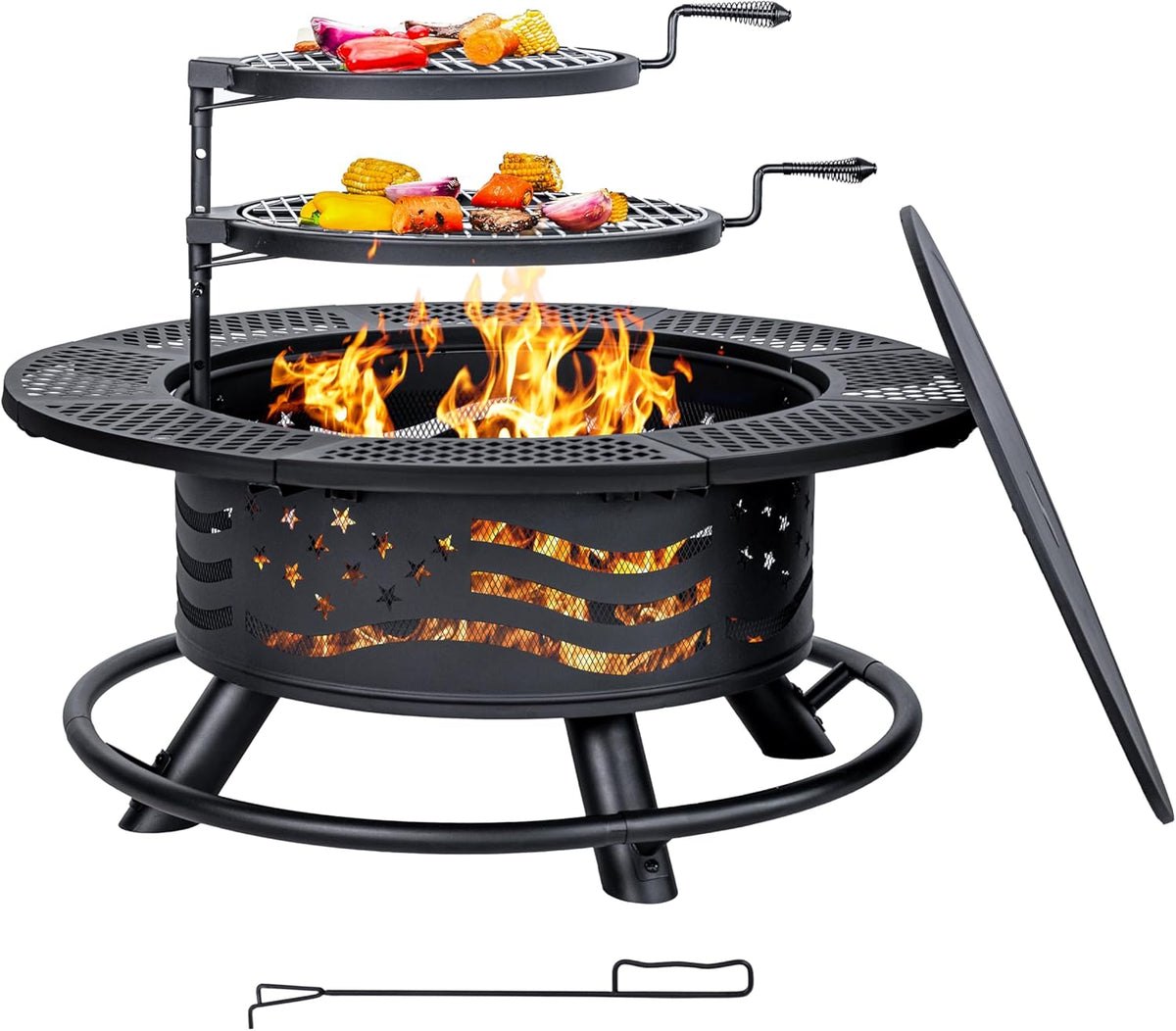 Black round wood-burning fire pit with two cooking grates and open flames in bowl