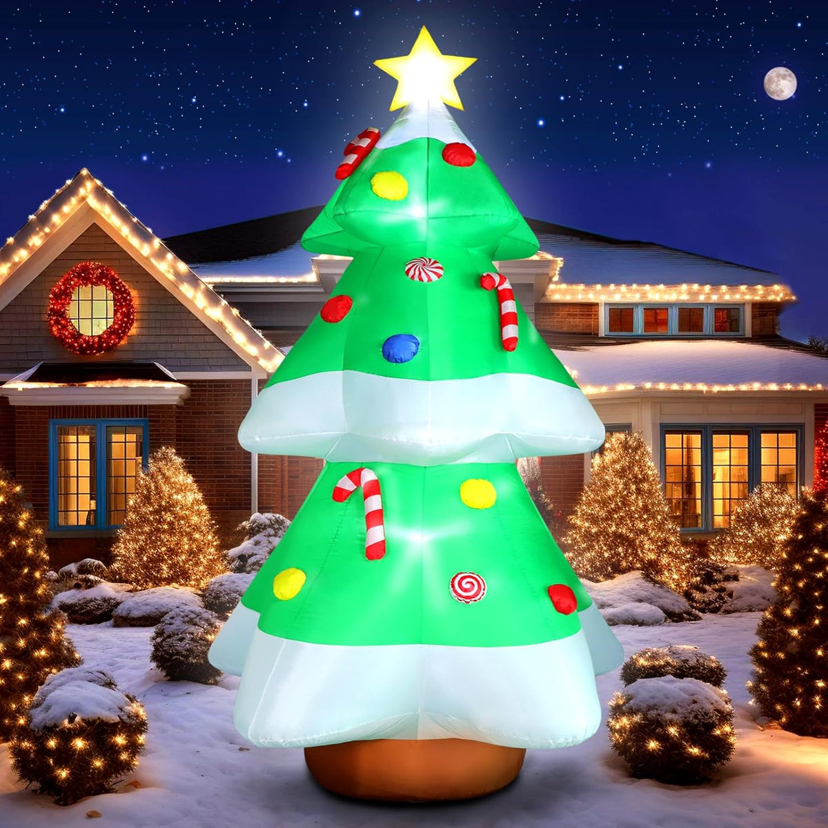 Inflatable Christmas tree with star top, candy-cane dots; bright glowing lights