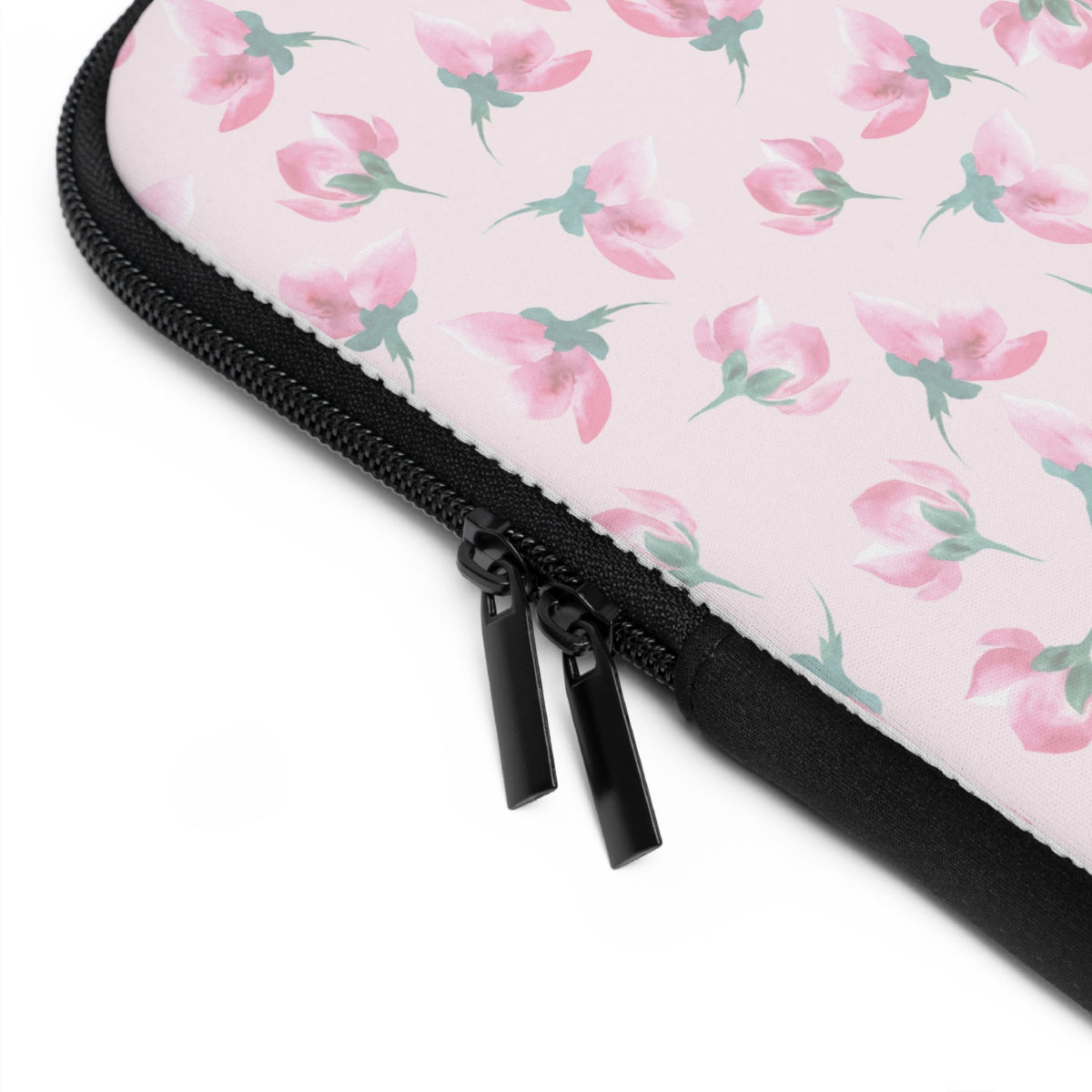 Floral laptop sleeve corner detail with black zipper and stitched trim
