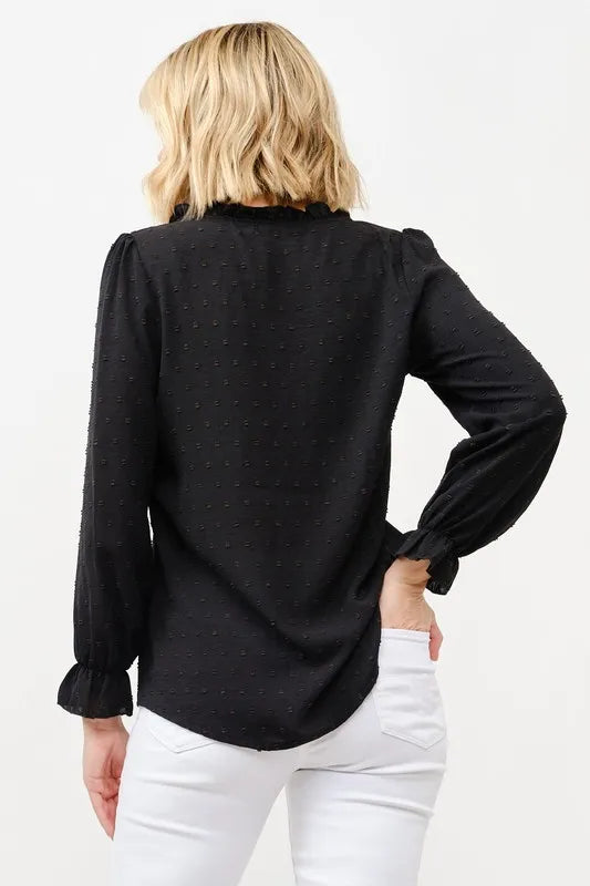 Black polka-dot blouse back view with gathered sleeves and soft ruffle detail