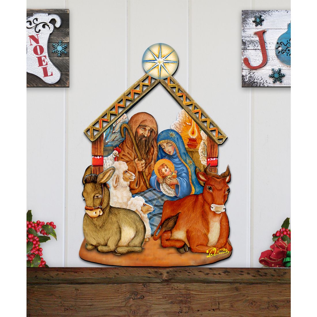 Nativity wooden door decor with manger scene, Mary, Joseph, animals, and star top