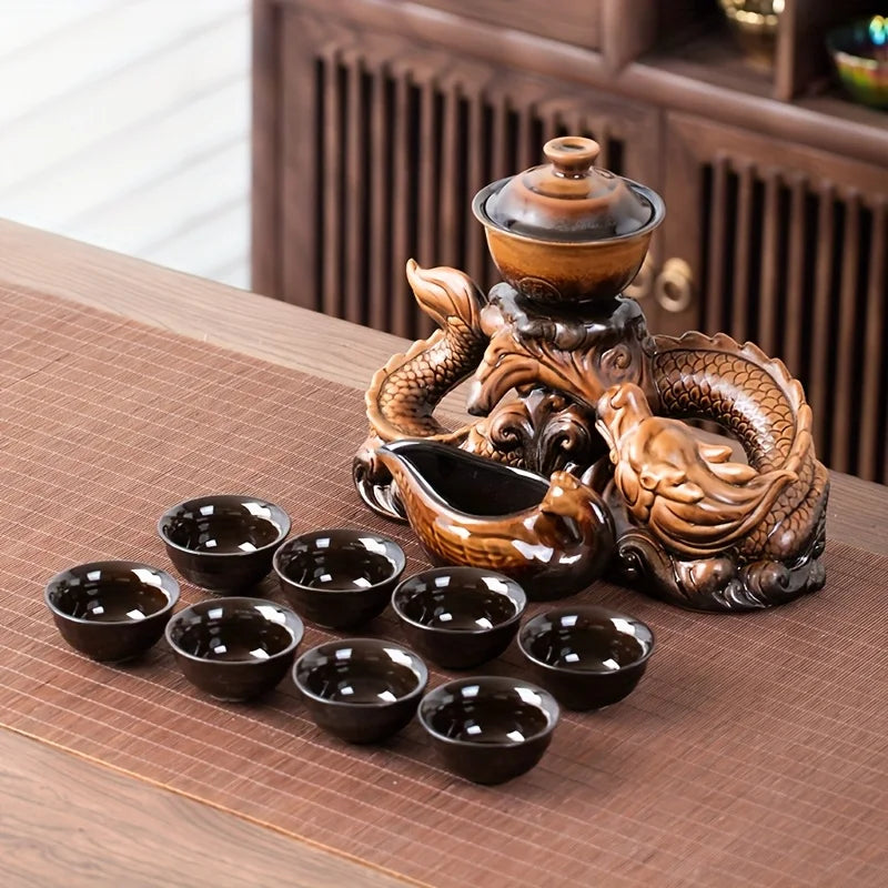 Ceramic dragon teapot set in bronze-gold finish with cups, dragon relief on tray