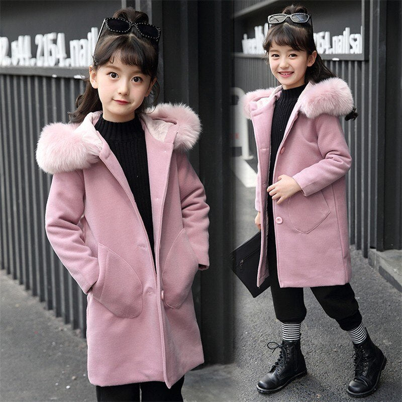 Girls pink hooded winter coat with faux fur shoulders and button placket, side pockets