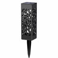 Black solar lantern light with geometric cutouts and pointed ground stake