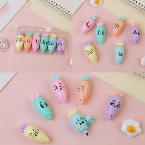 Assorted pastel cartoon capsule highlighters, including egg-shaped mini markers.
