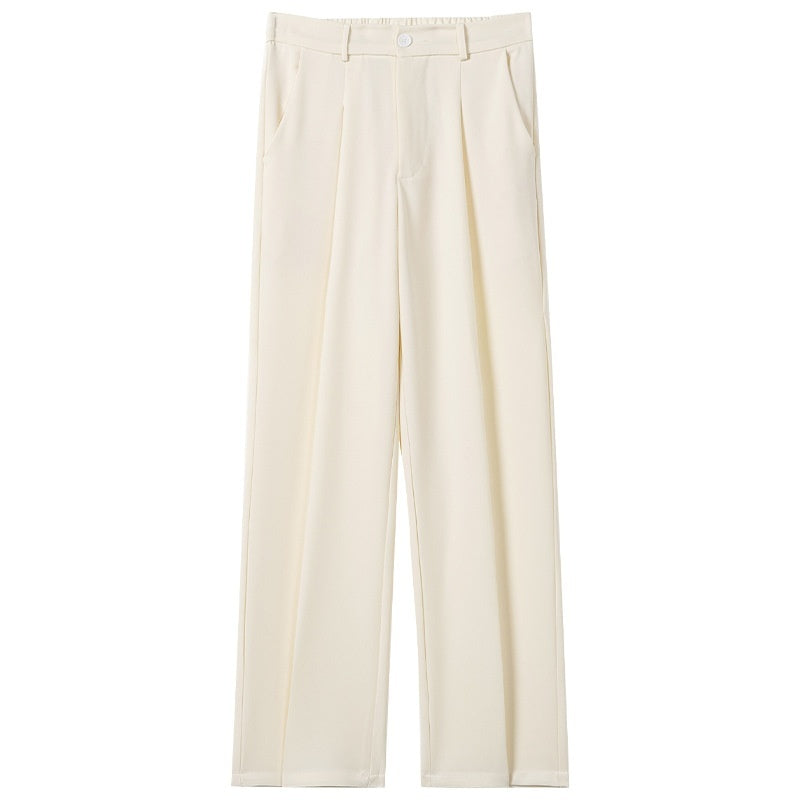 Cream straight suit trousers with belt loops, pleated front, and button closure