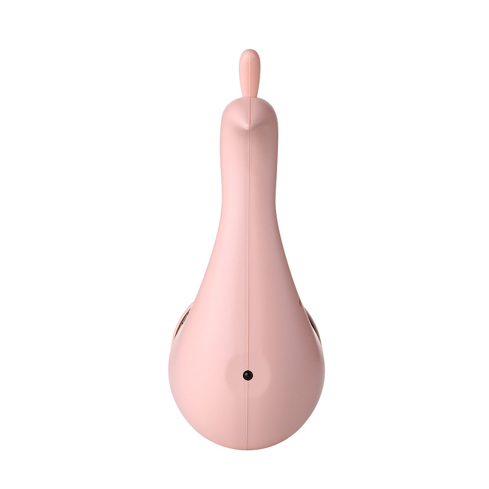 Pink peacock-shaped wall lamp with small dot on side