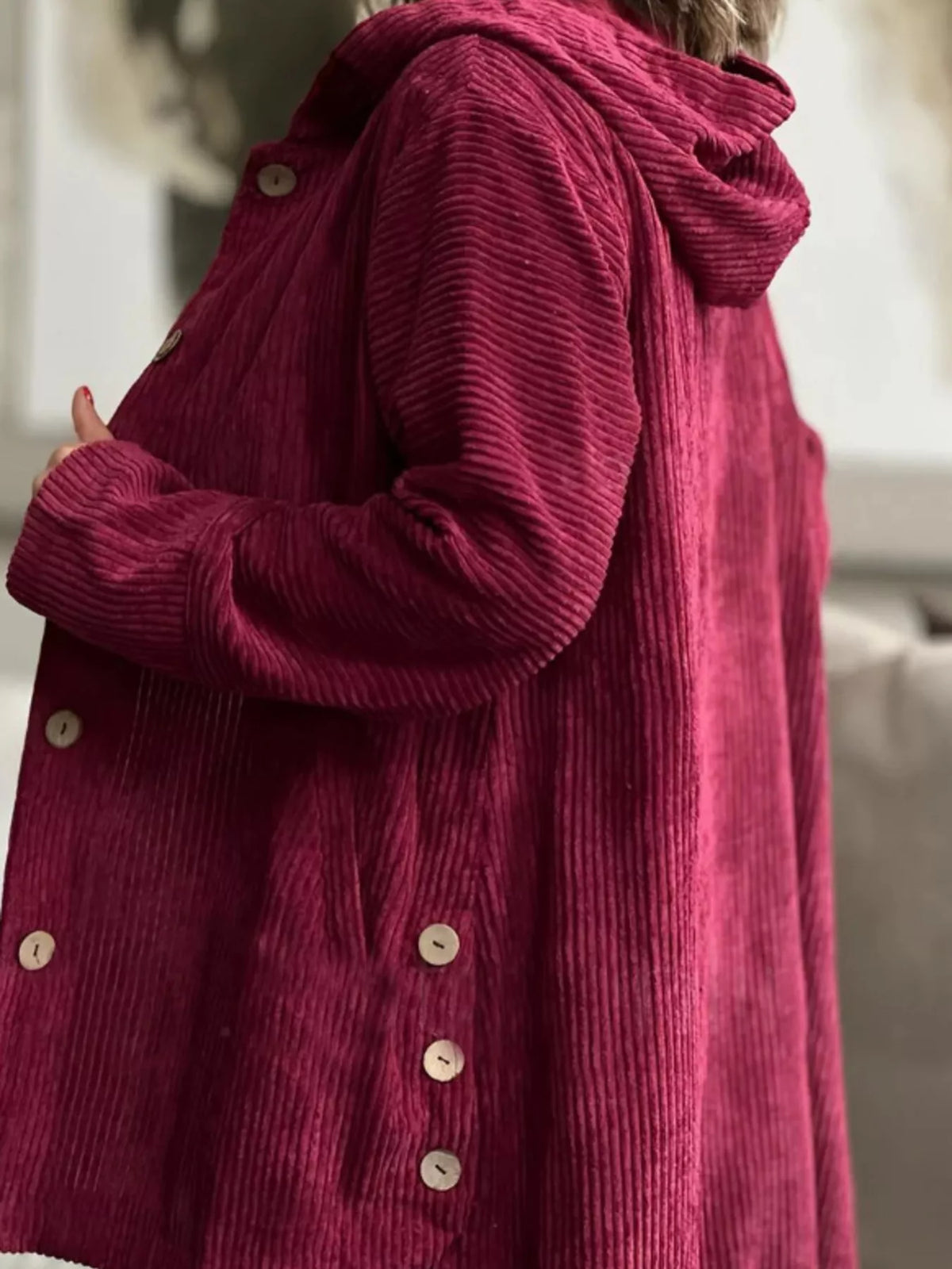 Burgundy corduroy hooded button-up jacket, back/side view, button details and cuffs