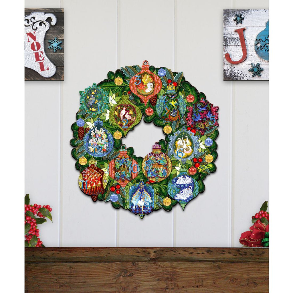 12 Days of Christmas door wreath with layered numbered ornaments and green foliage