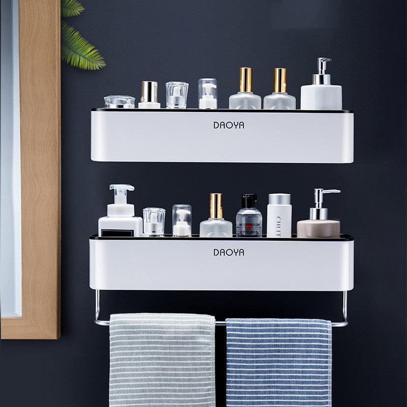 Wall-mounted bathroom shelf with two tiers, white shelves, towels and toiletries