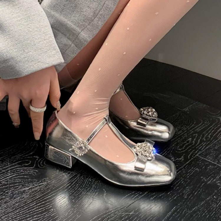Women’s silver Mary Jane single shoe with square rhinestone straps and mid heel
