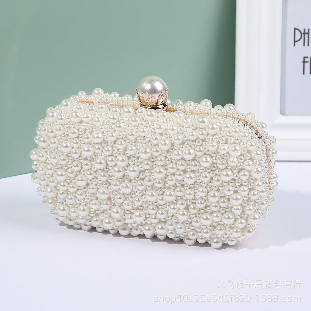 White pearl bead dinner clutch with gold-tone clasp and short handle