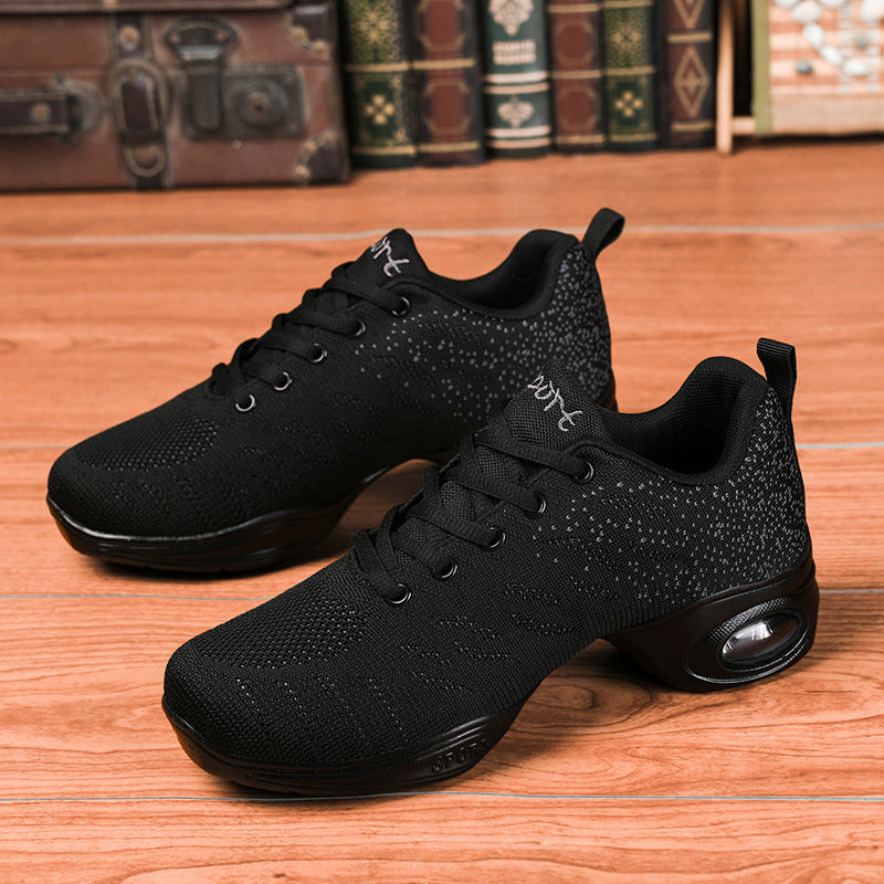 Black mesh dance shoes with lace-up closure, low mid-heel