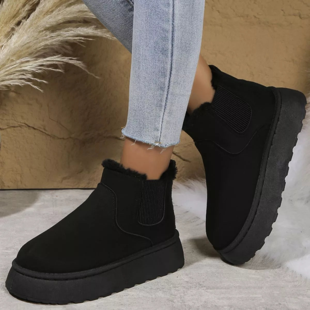 Black platform ankle boots with round toe and elastic side panels