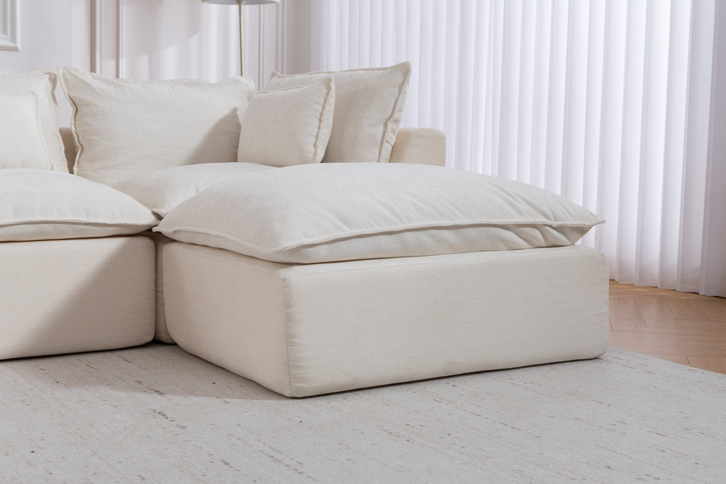 Cloud Couch oversized modular sectional sofa in antique white, ottoman-style chaise