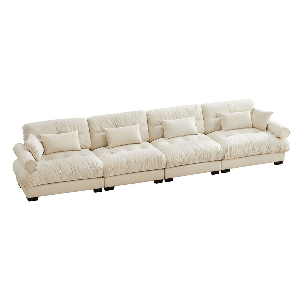 Beige modular sectional sofa with deep cushions, rolled arms, and multiple seat sections