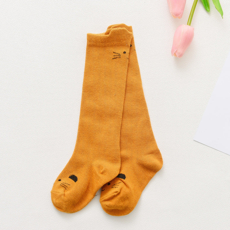 Orange children’s cartoon animal socks with small face graphic at cuff and toe