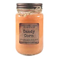 Candy corn scented soy candle in clear glass mason jar, peach wax, metal lid