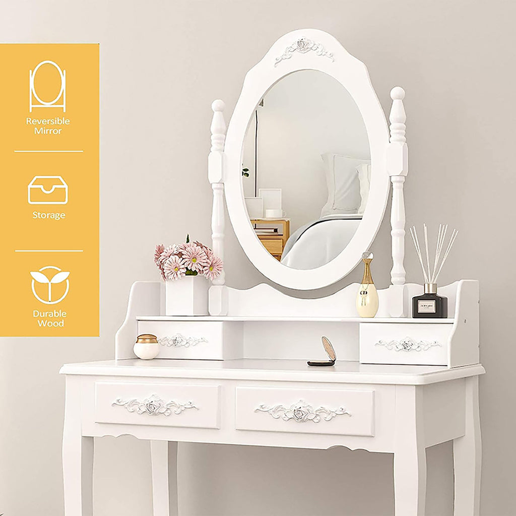 White vanity table with decorative oval mirror and drawer storage, styled for makeup