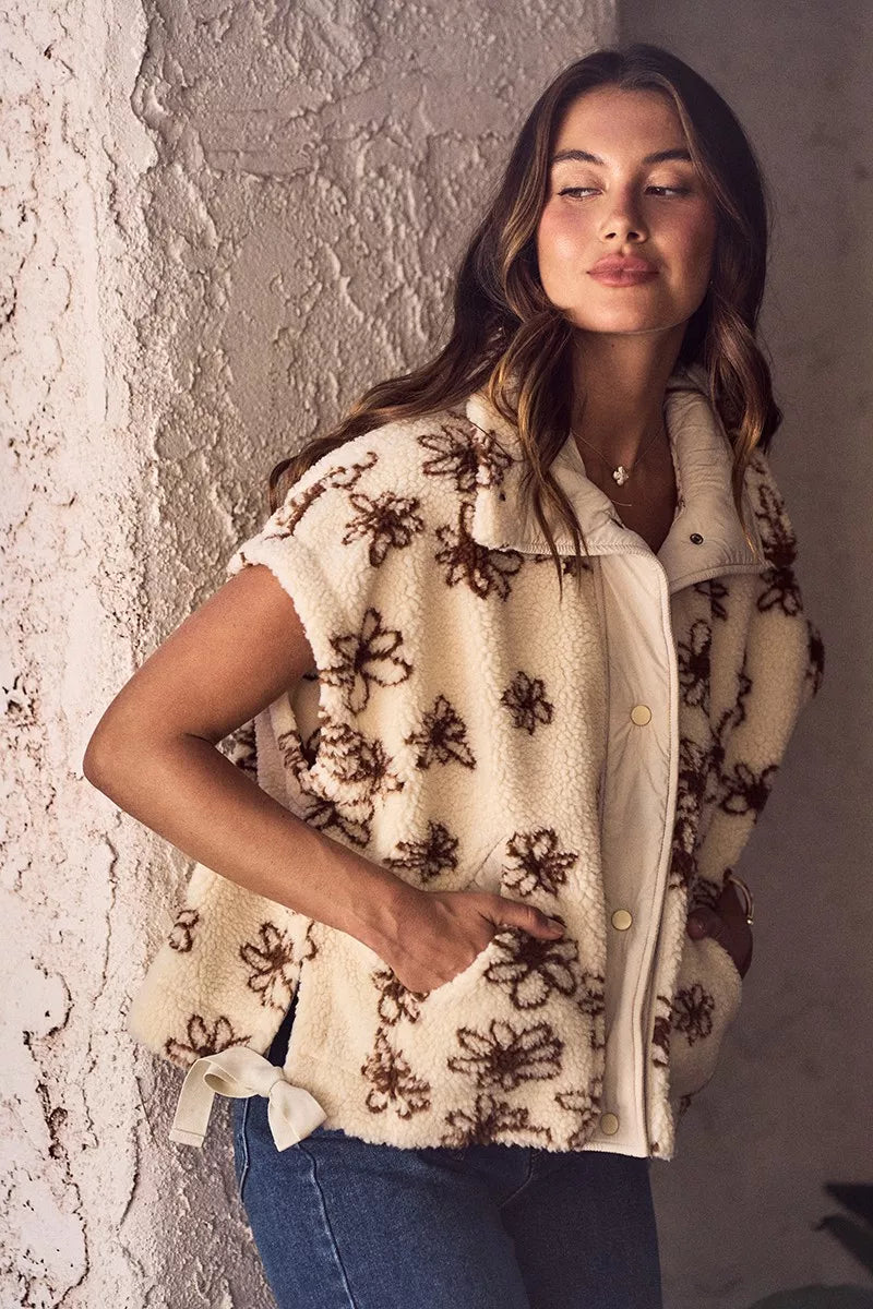 Oversized sleeveless sherpa vest jacket, cream with dark brown floral embroidery, side ties