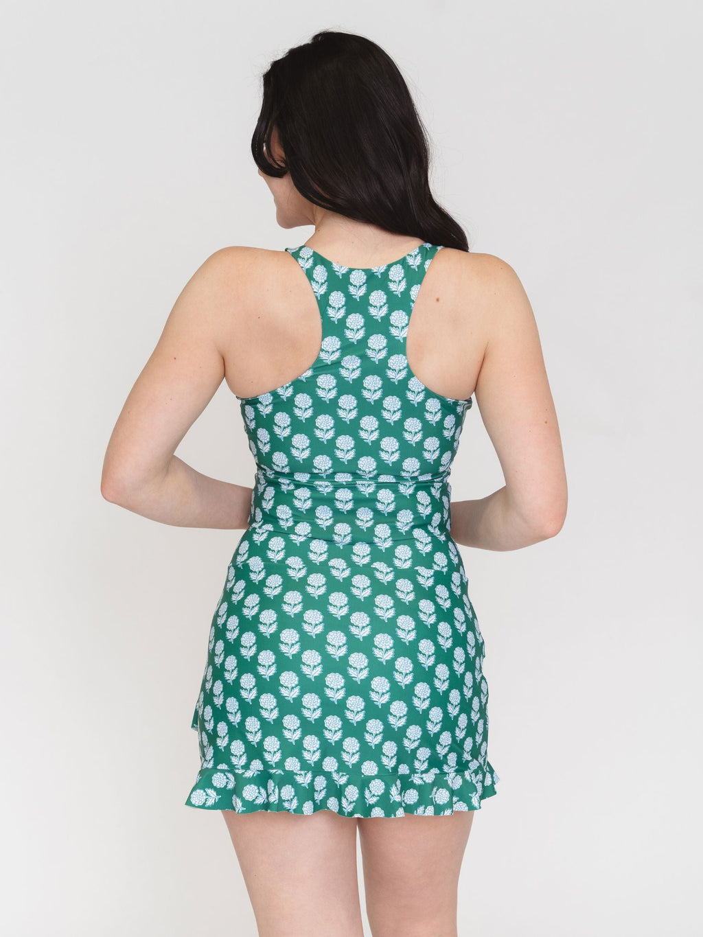 Green ruffle skirt with white flower print, layered flared hem at back