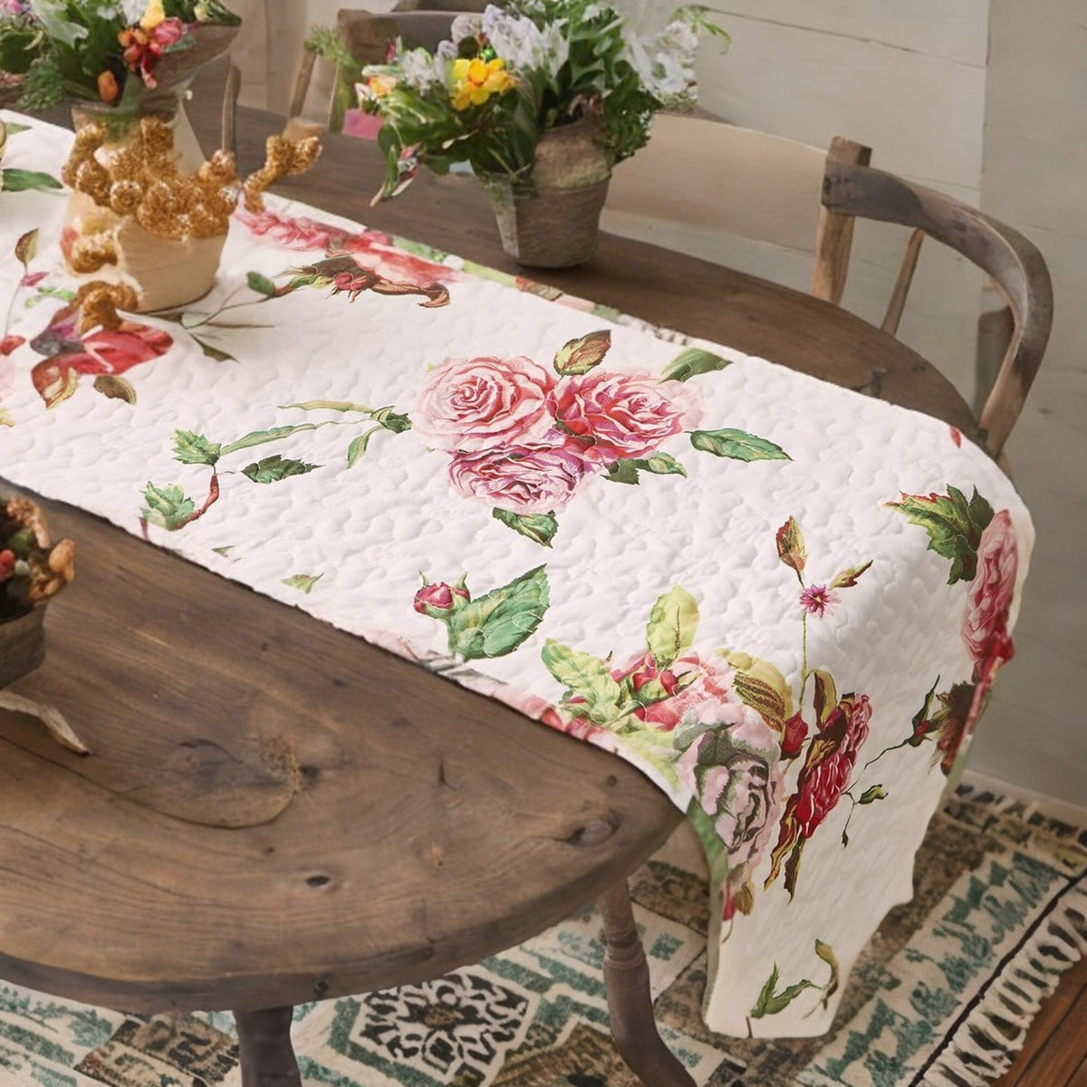 Quilted dining table runner with pink rose and butterfly floral design on white