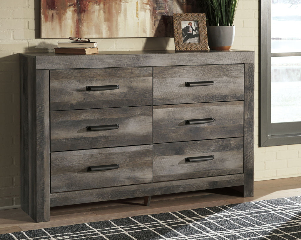 Gray wood dresser with six drawers and black bar drawer pulls