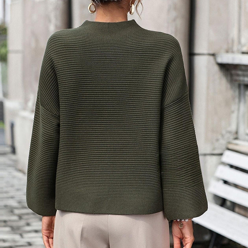 Women’s loose pullover sweater in dark green, crew neck, back view, long sleeves