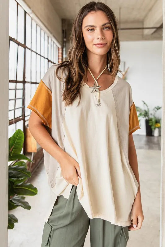 Color-block V-neck short-sleeve t-shirt, cream body with orange cuffed sleeves