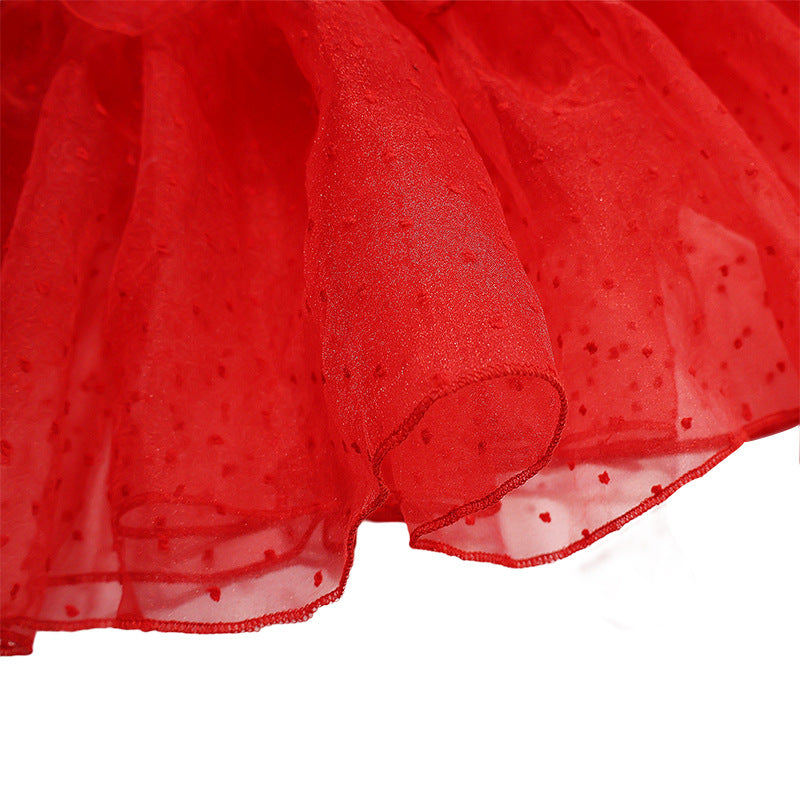 Red tulle skirt detail with scalloped hem and dotted sheer overlay