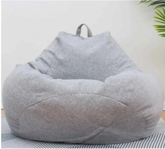 Gray giant bean bag chair with carry handle and rounded seat