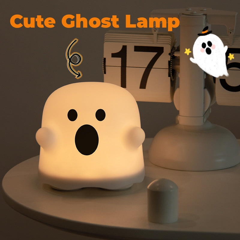 Silicone ghost night light lamp with open-mouth face, warm glow LED bedside lamp.