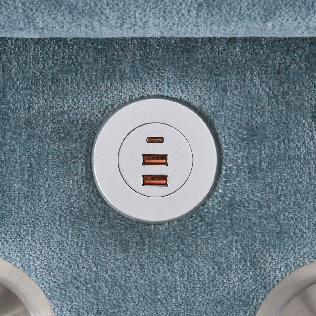 Upholstered section with built-in USB charging panel on textured dark fabric