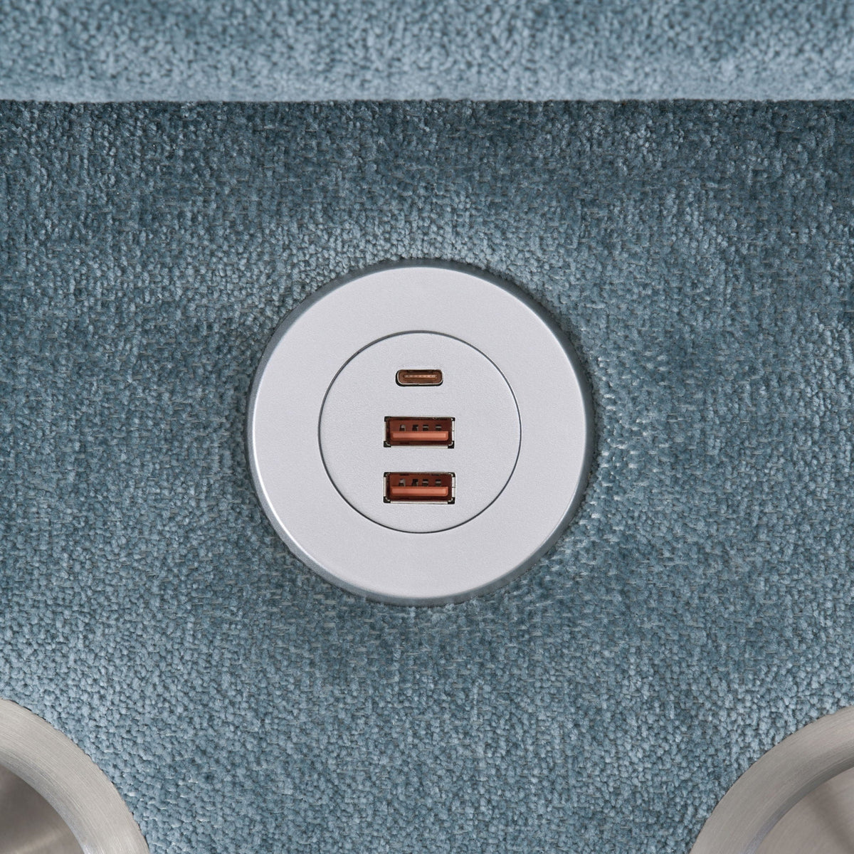Upholstered section with built-in USB charging panel on textured dark fabric