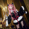 Black Halloween dress with white ruffles, red trim, and horned shoulder cape detail