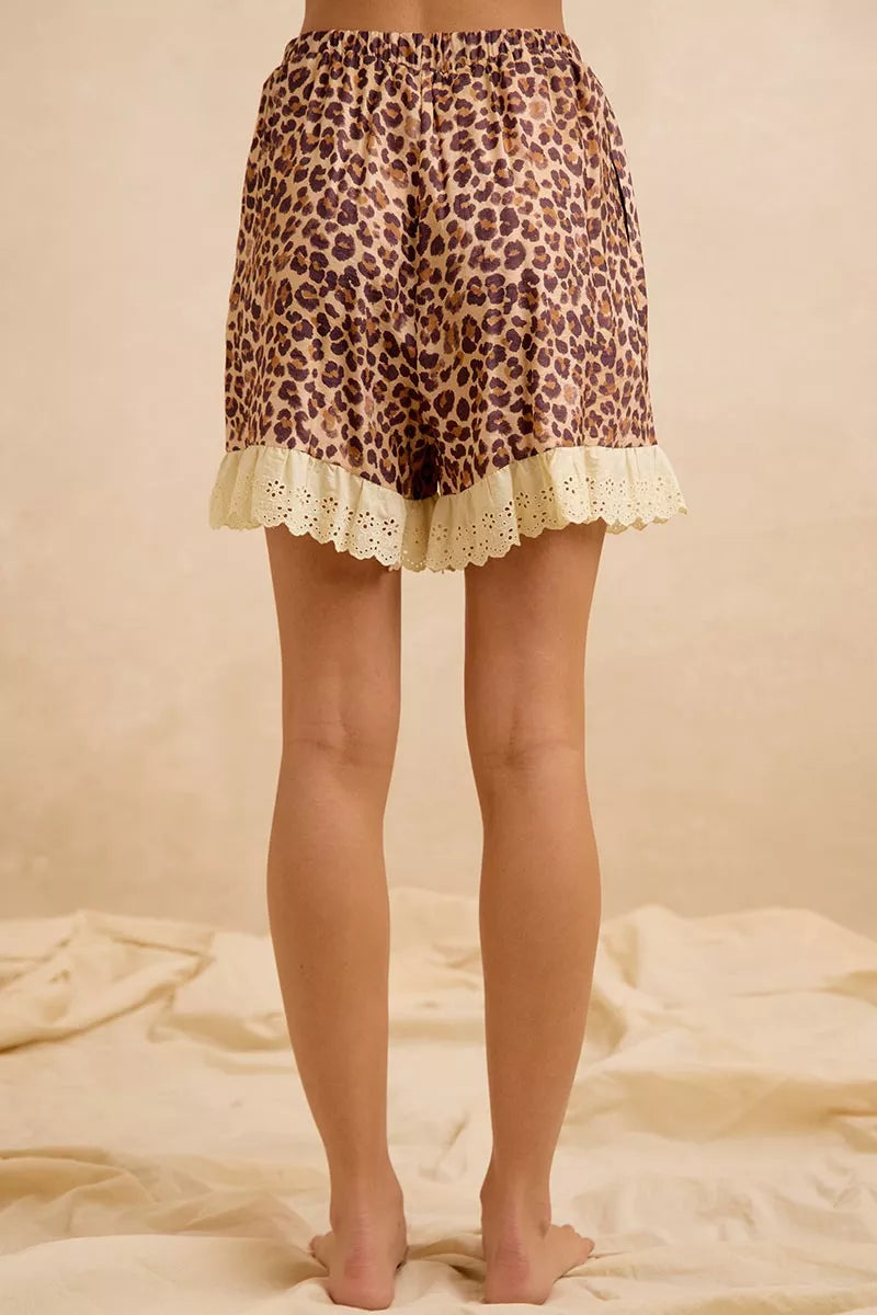 Leopard print elastic-waist shorts with eyelet lace hem, full view