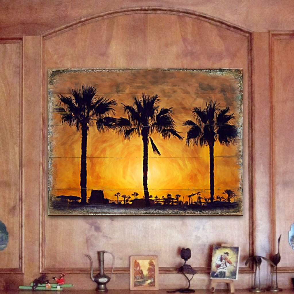 Palm tree sunset wooden wall art on wall paneling, framed palms against dusk glow