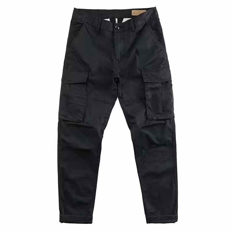 Men's cargo work pants in black, straight-leg fit with flap cargo pockets and utility seams