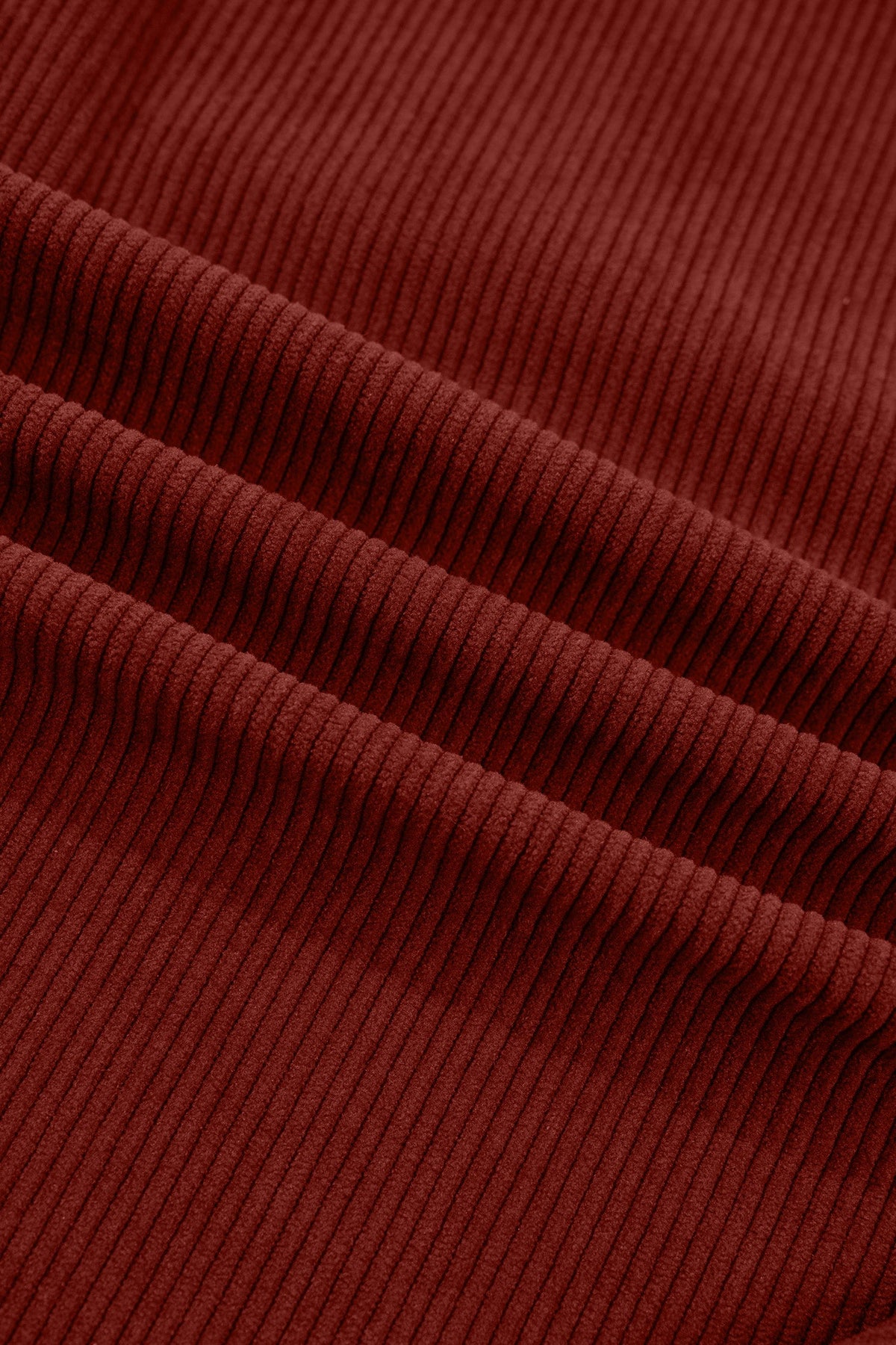 Clay ribbed corduroy fabric texture close-up.